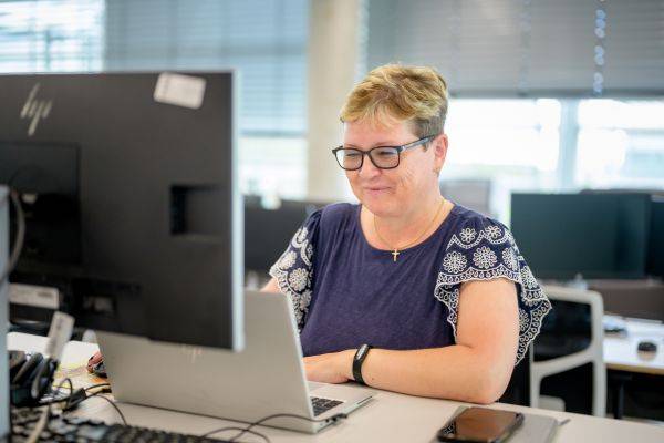 Older woman working at computer